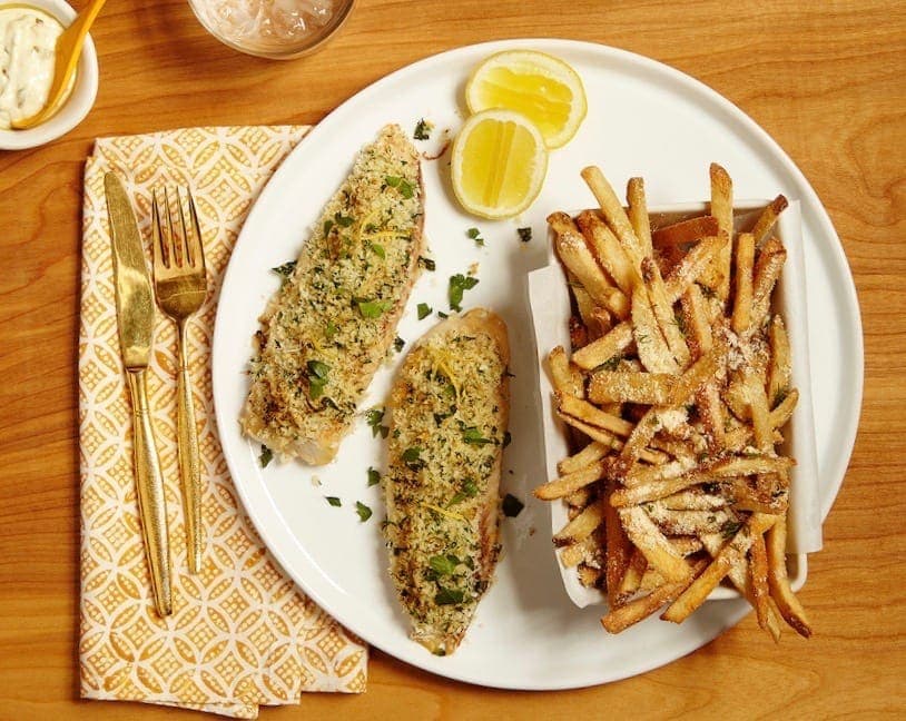 Crispy Lemon Fish on a plate with Parmesan Fries