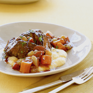 short ribs with polenta in a bowl