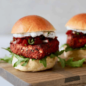 Blackened salmon sliders on cutting board