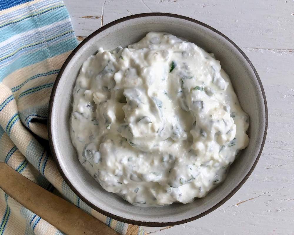 Greek yogurt and feta sauce in a bowl