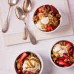 Yogurt breakfast bowl recipe with spoons