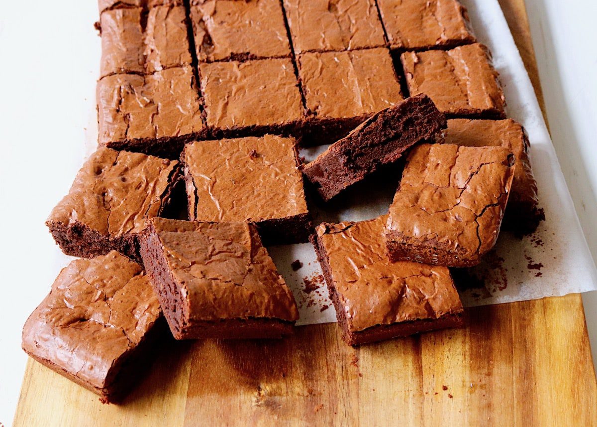 a tray with cut square classic brownies