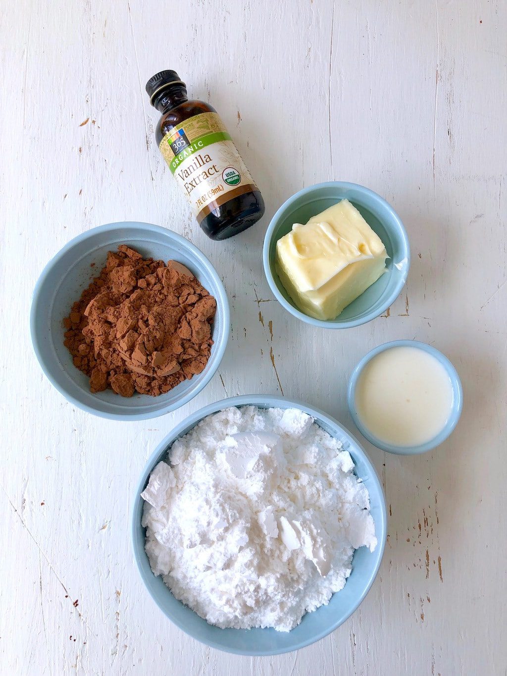 Cocoa powder, vanilla, butter, milk, and confectioner's sugar