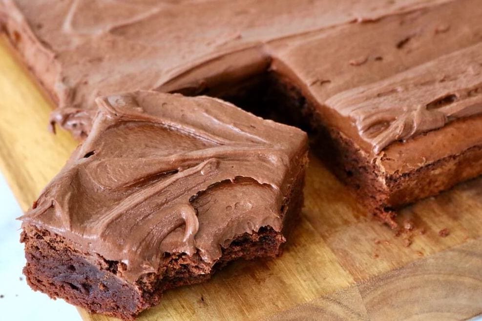 Frosted Brownies with a bite out