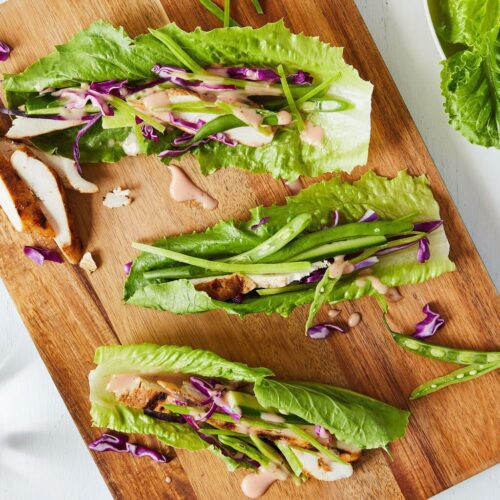 chicken lettuce wraps on a cutting board