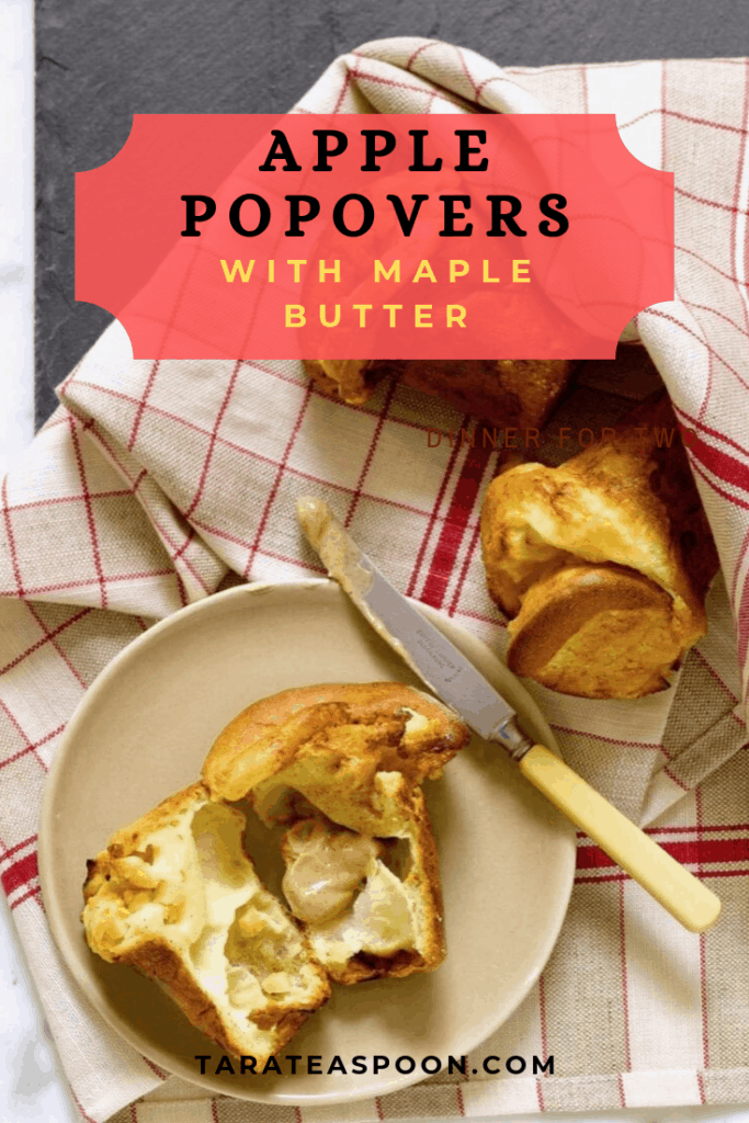 apple popovers with maple butter on a white plate with red and white checked napkin