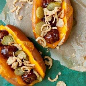 barbecue meatballs subs with crispy onions and pickles