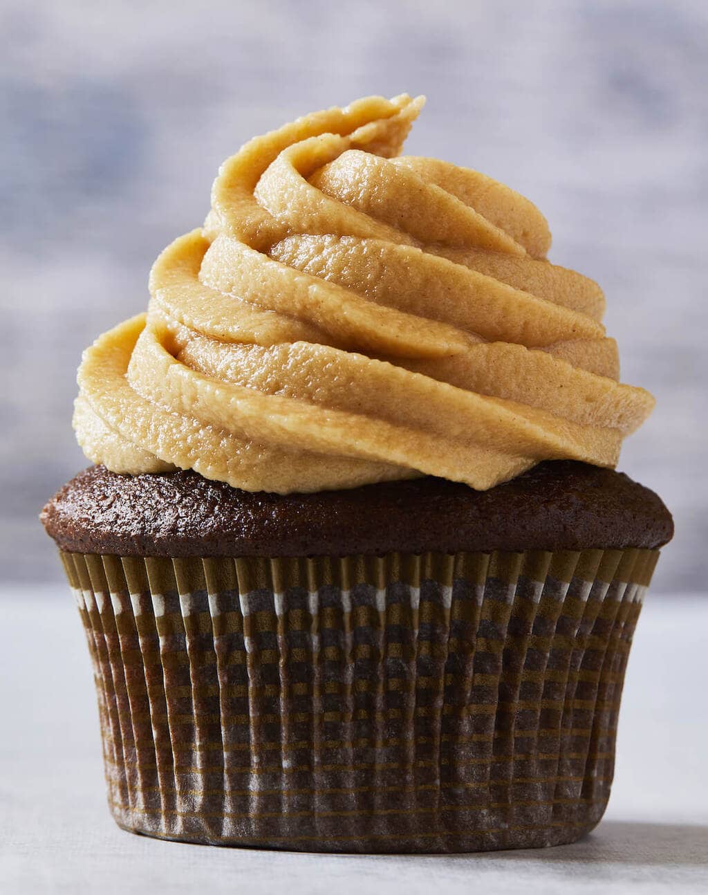 chocolate cupcake with piped peanut butter frosting