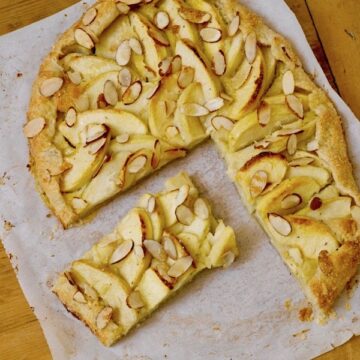 rustic apple tart with sliced almonds on top