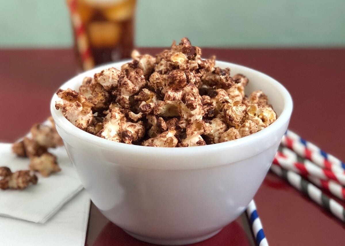 chocolate malt popcorn in white bowl