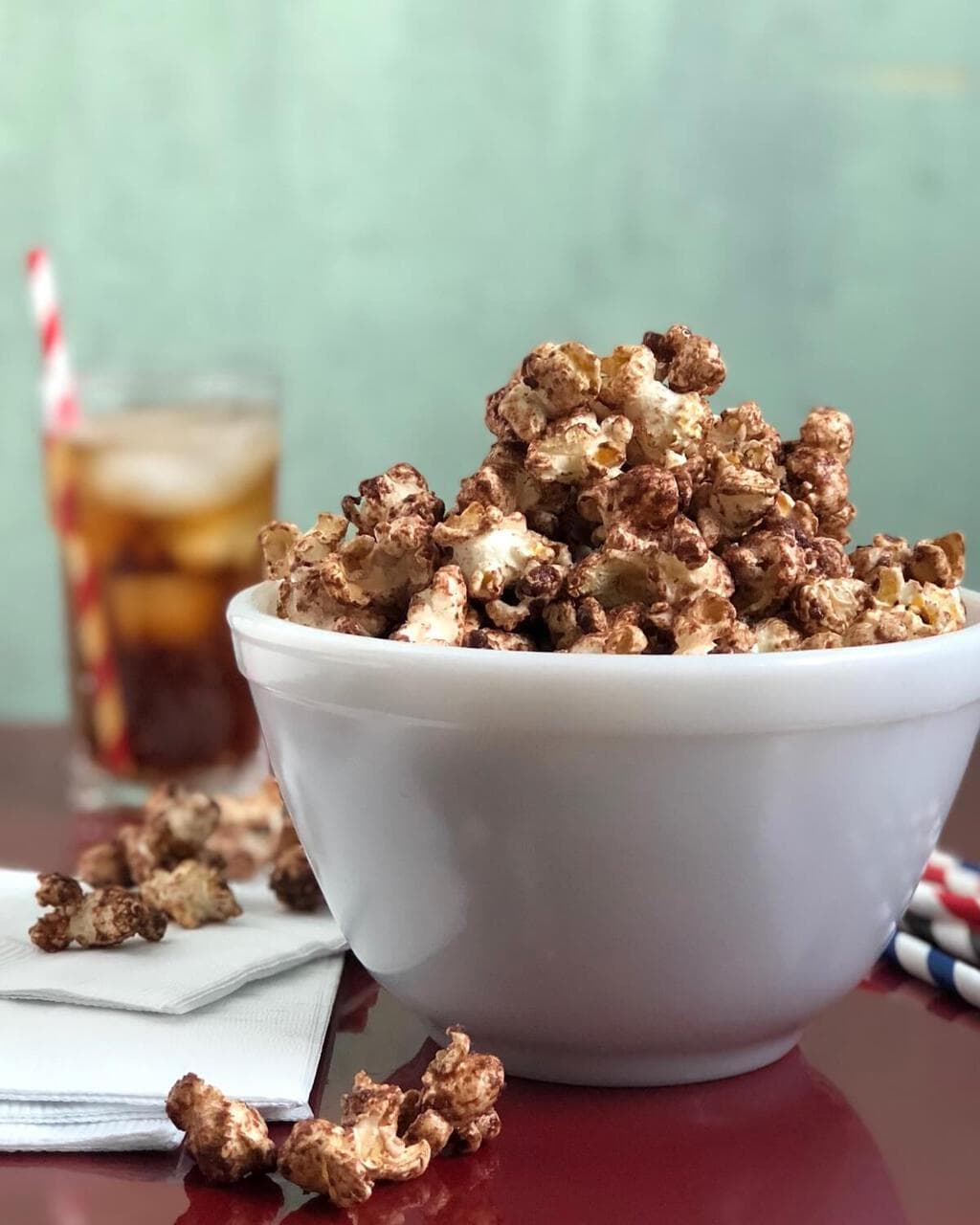 chocolate malt popcorn topping recipe in a white bowl