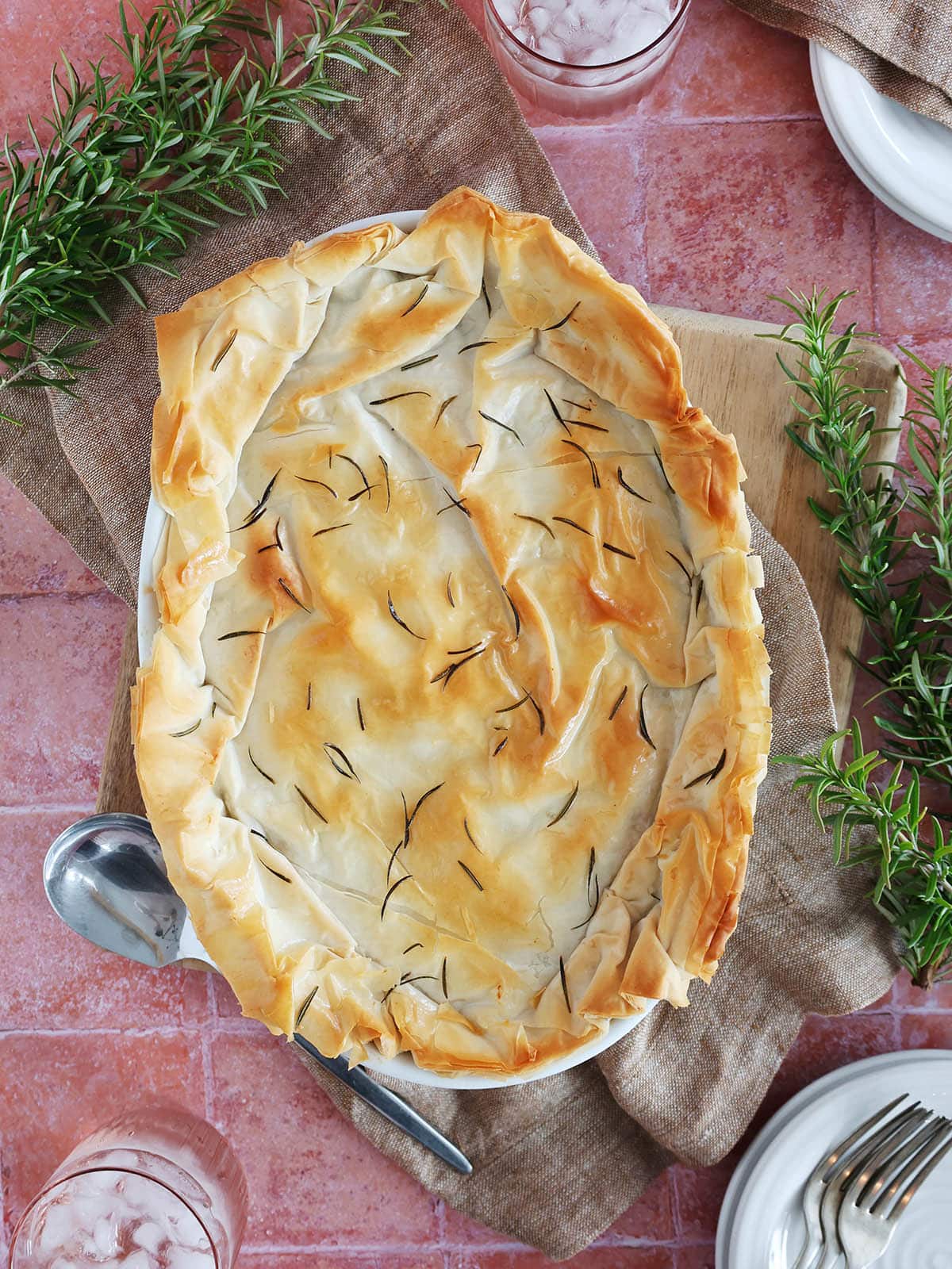 Overhead view of a chicken spinach casserole topped with phyllo dough.