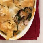 Chicken Mushroom Spinach Pie with a serving missing