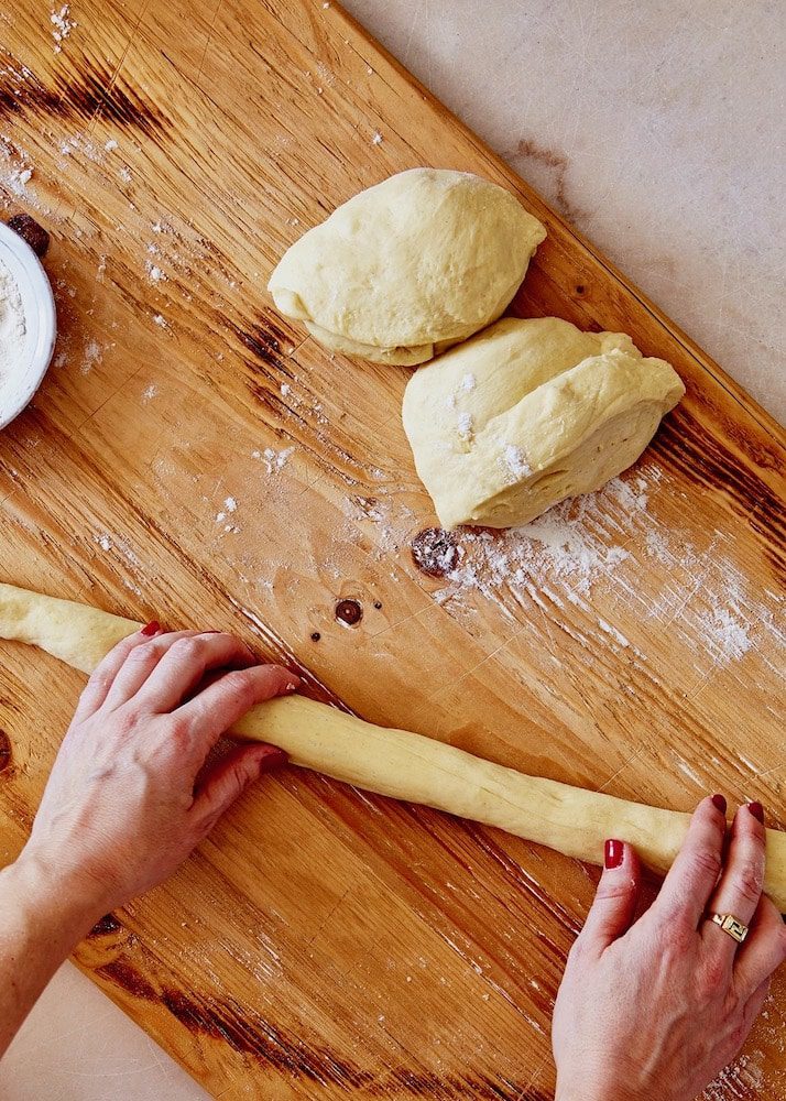 rolling pulla bread dough into ropes