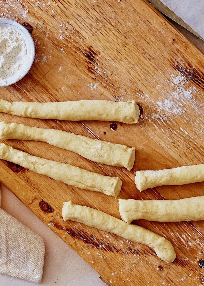 Cutting the pulla bread dough ropes