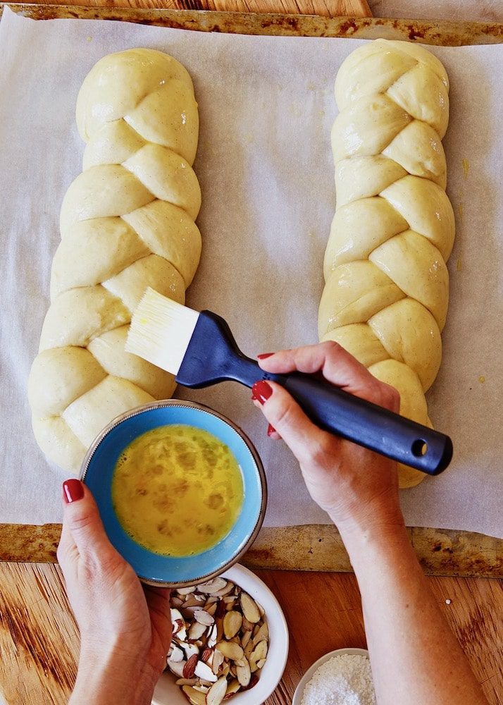 brushing braided loaves with egg wash