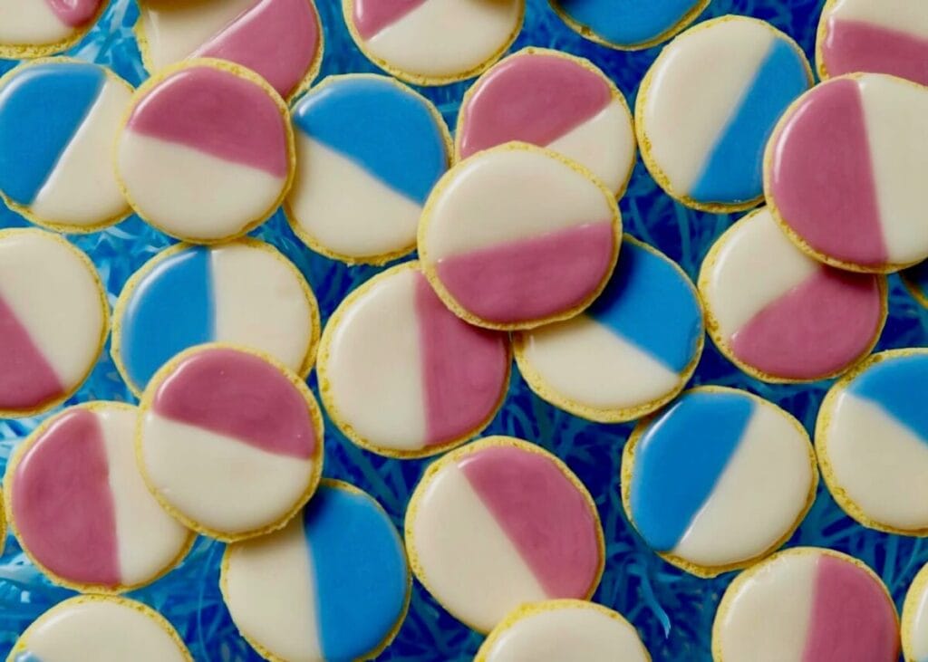 Pastel pink and blue frosted cookies