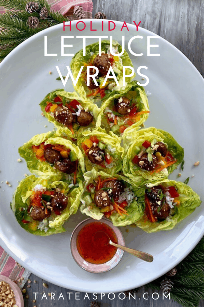 lettuce wrap with meatballs arranged on white plate