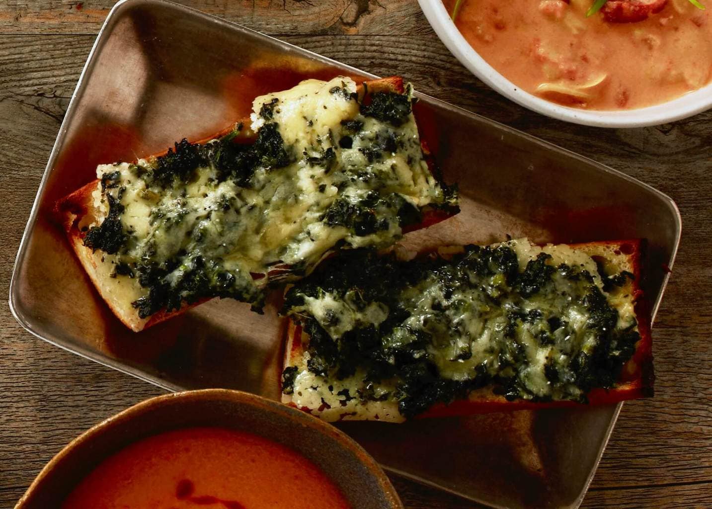 spinach cheese toast on tray