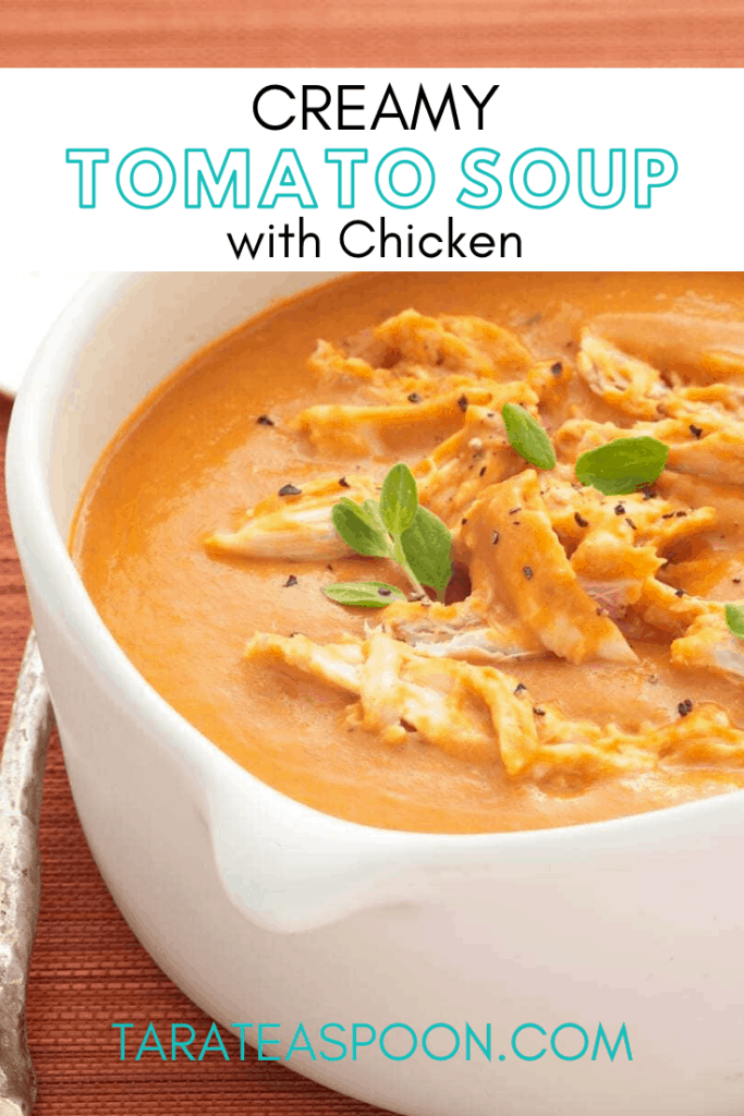 Creamy Tomato Soup with Chicken in white bowl