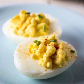 deviled eggs on blue plate