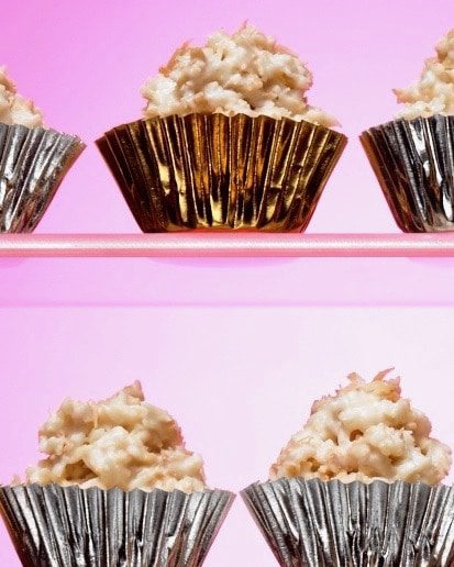 white chocolate coconut candy in metallic cups