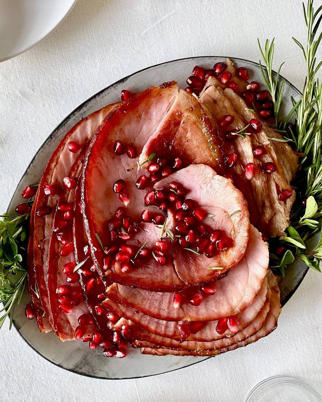 holiday sliced ham with pomegranates
