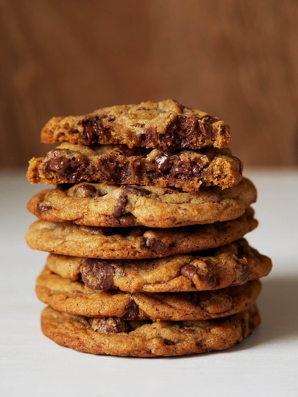 melty chocolate chips in stack of cookies