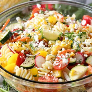 Salad in a glass mixing bowl