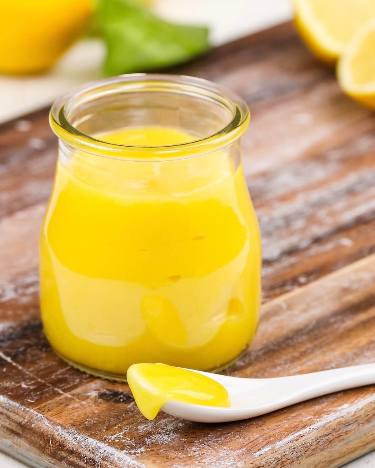 thick lemon curd in a jar for cake filling