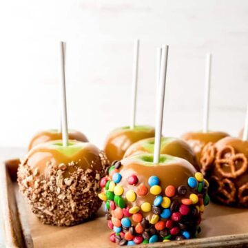 candy apples with caramel and toppings