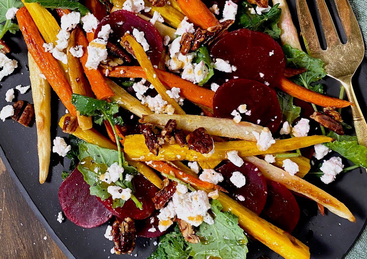 close up of roasted carrots and beets with goat cheese