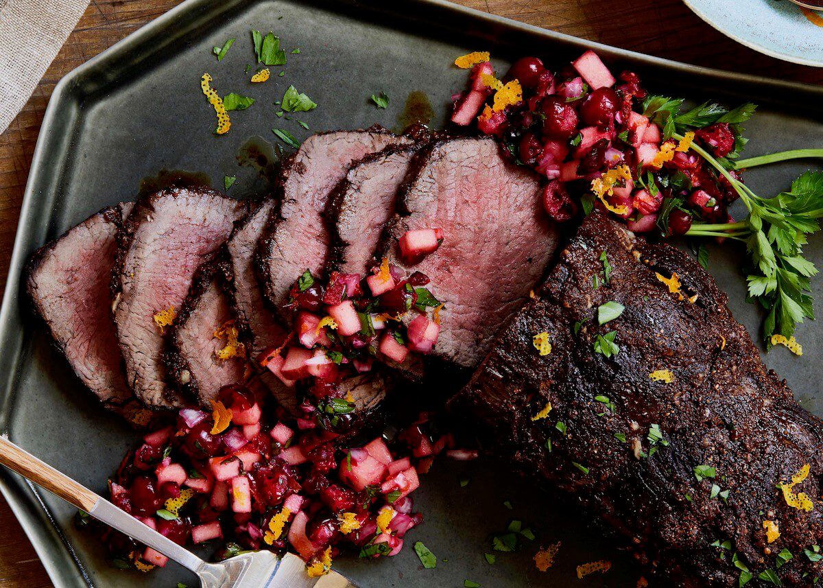 cranberry beef tenderloin holiday roast on platter