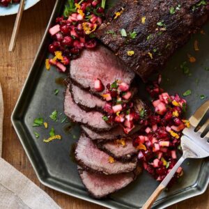 beef tenderloin roast with cranberry relish on platter