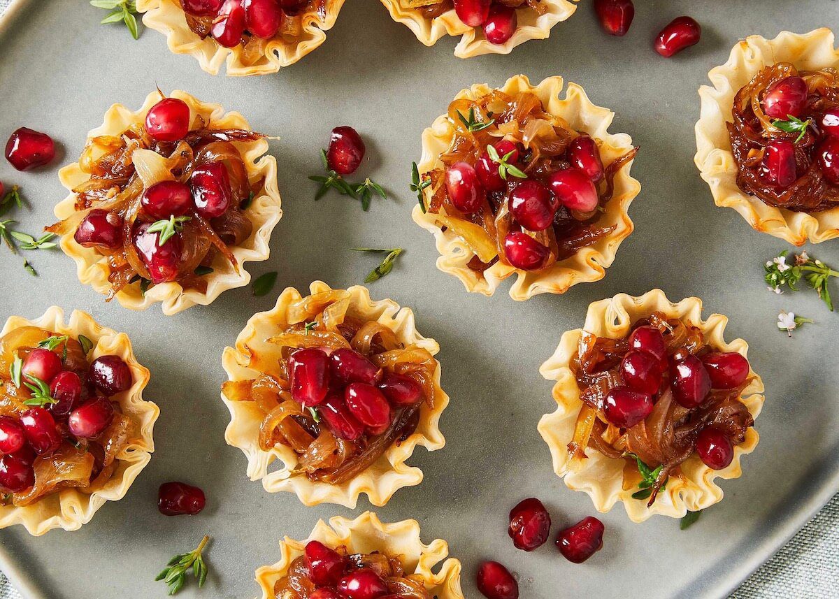 french onion tartlets with pomegranates