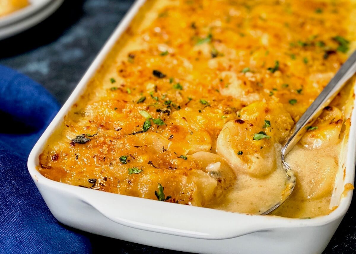 cheesy potato casserole with spoon