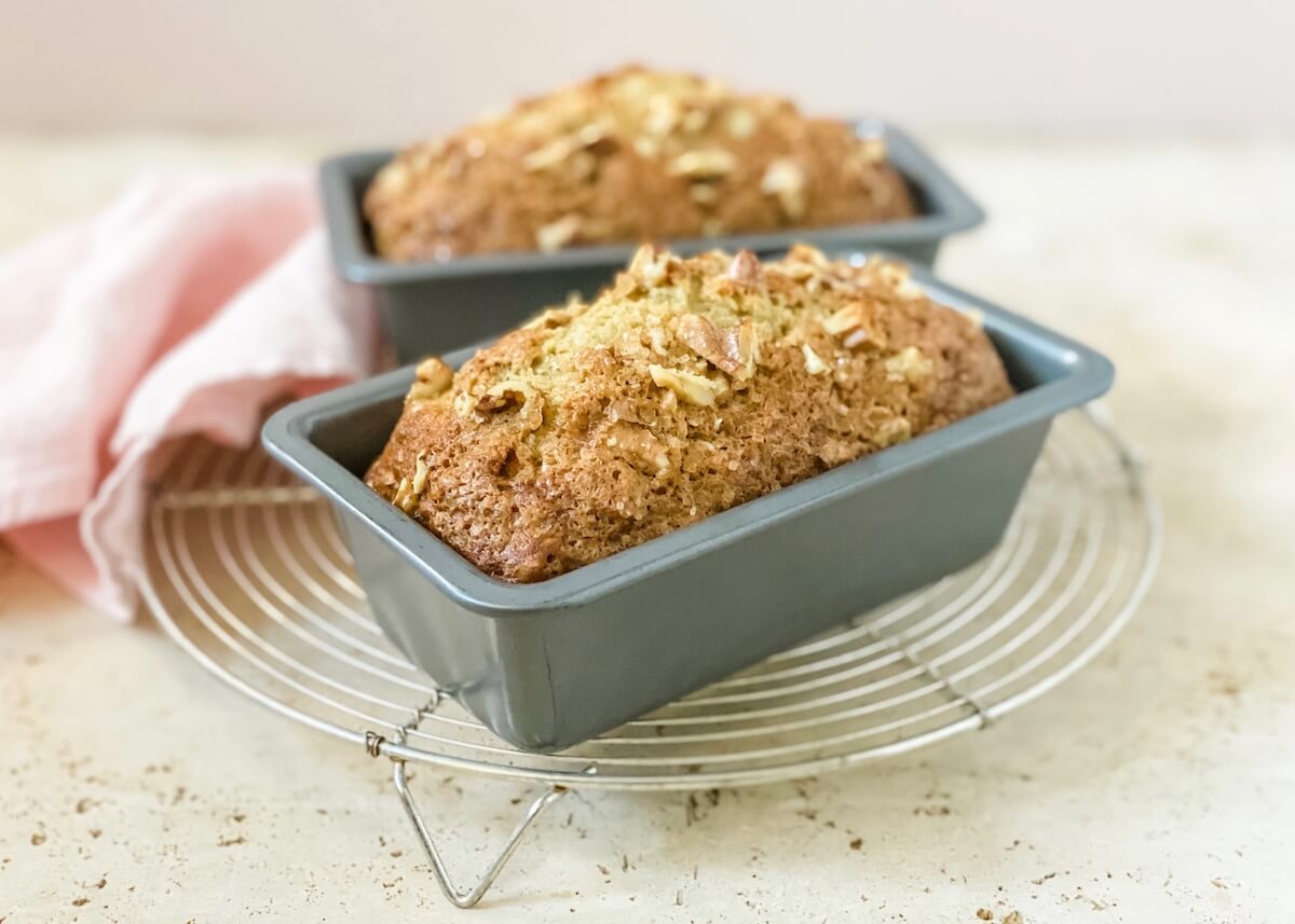 banana bread in pans on cooling rack
