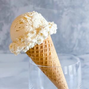 ice cream cone tipped in a glass square