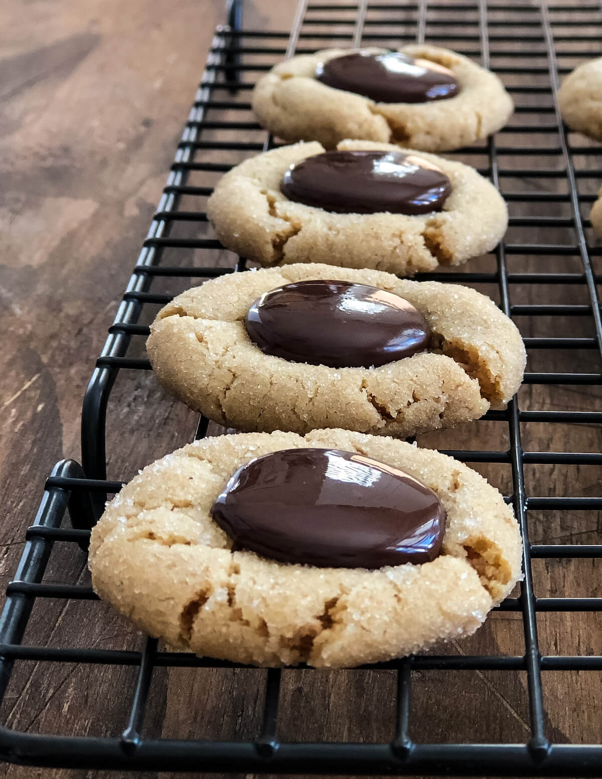 cashew butter blossom cookies cooling on rack