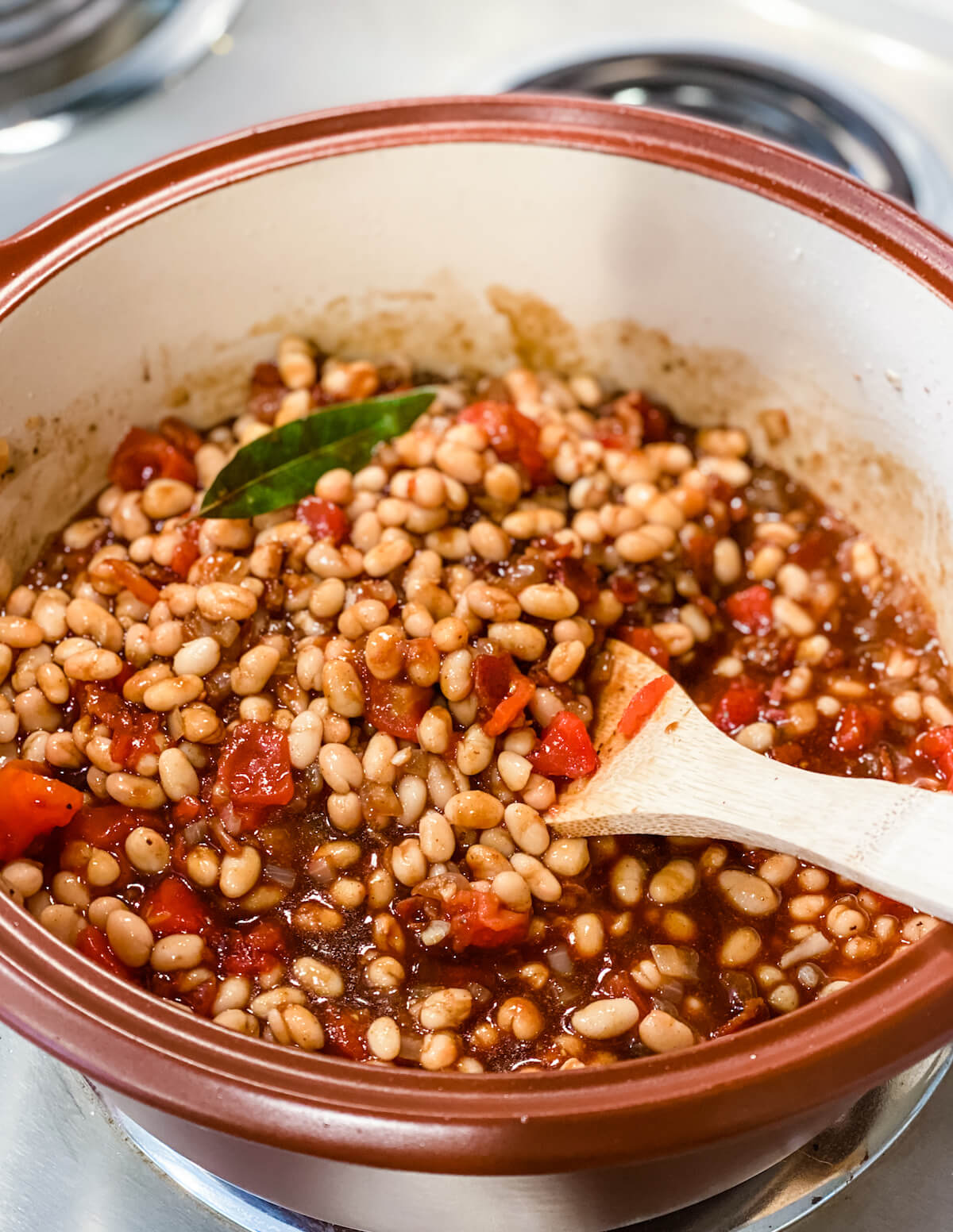 process of boston baked beans in pot with ingredients