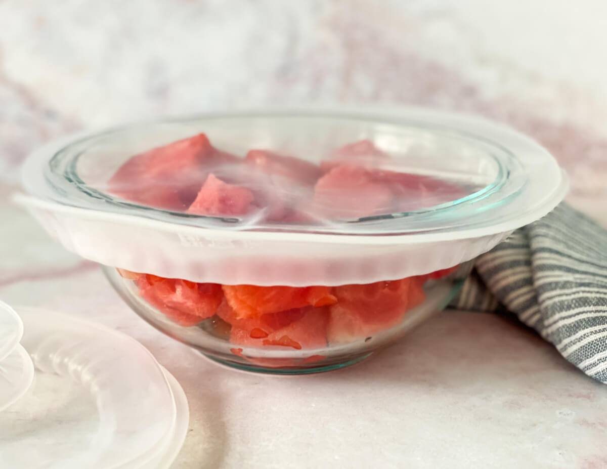 silicone lid on bowl of watermelon