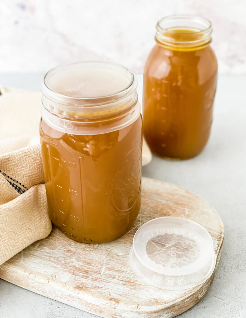 turkey stock with silicone lid and glass jar