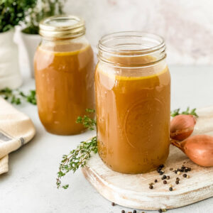 homemade turkey stock in glass jar