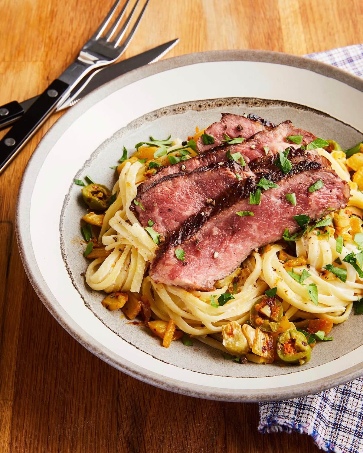 dinner recipe with steak and linguini with olives