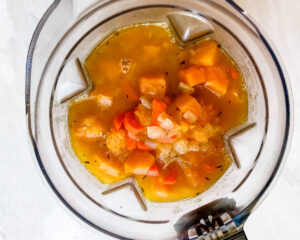 blending ingredients for butternut squash carrot soup