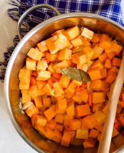 cooking butternut squash and carrots for soup