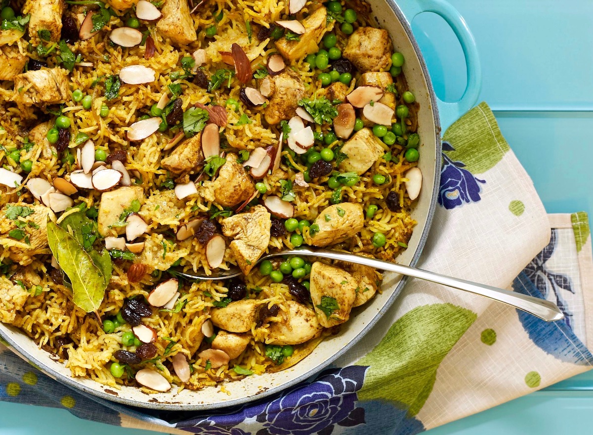 biryani with chicken and peas in pan