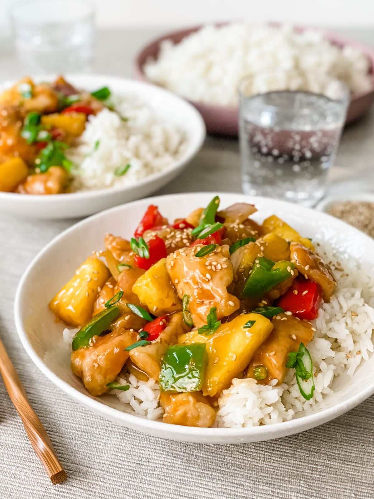 dinner setting of sweet and sour chicken