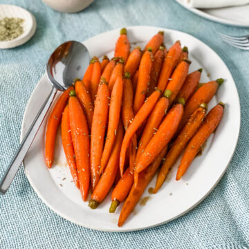 brown sugar glazed carrots on a platter