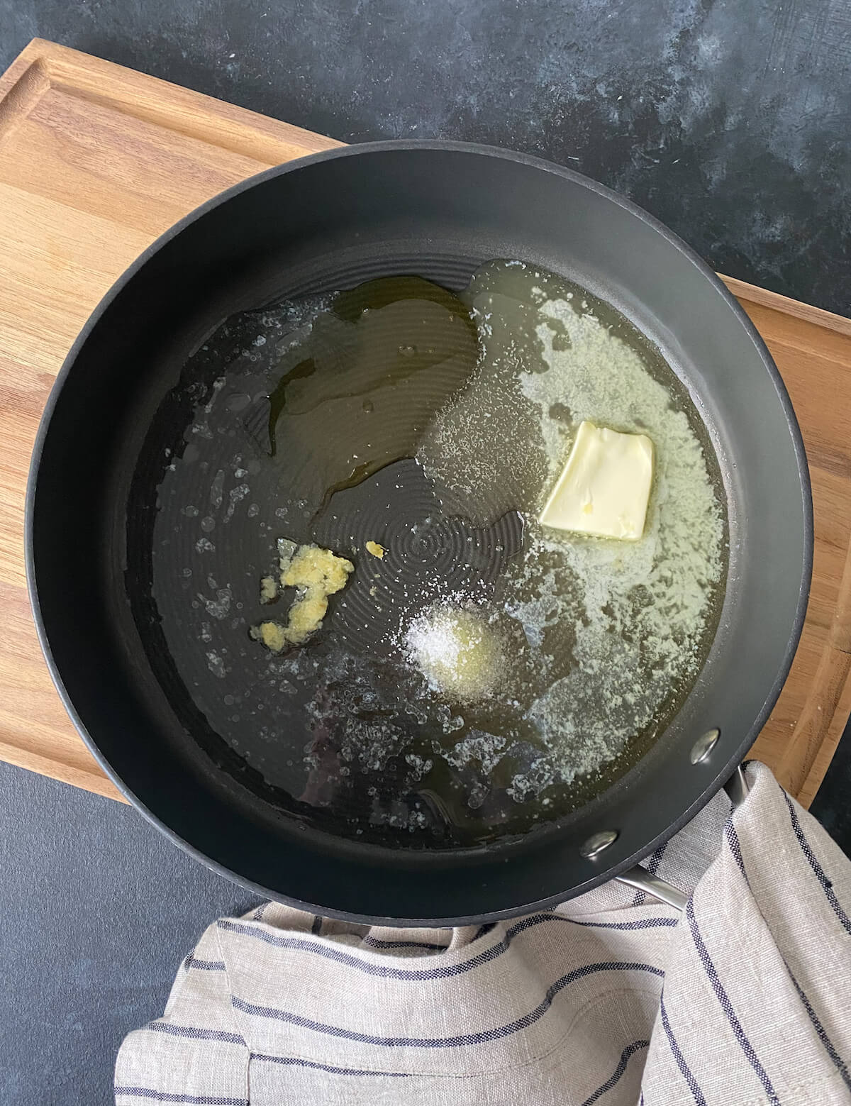 honey and garlic with butter in a skillet